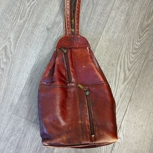 Queros violate Columbian leather bag